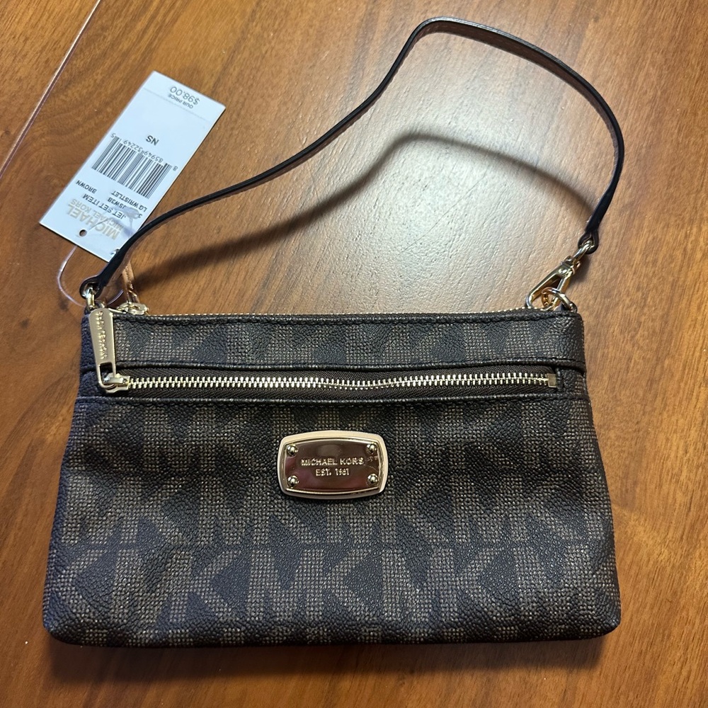 Michael Kors Wristlet. Brand new never been used.